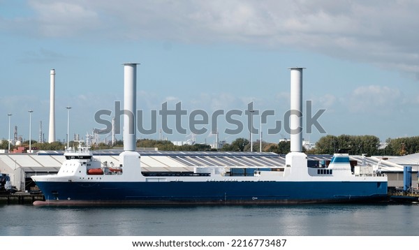 Port of Rotterdam, Netherlands - 10 05 2022:\
Retrofitted vessel with tillable rotor sails during operations in\
the European port
