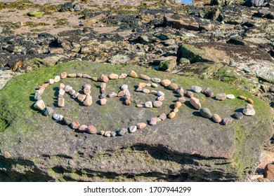 Port Seton, East Lothian, UK - April 19th 2020: Pebble NHS Appreciation Message On Beach Rock