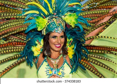 PORT OF SPAIN, TRINIDAD - February 9: A Female Masquerader enjoys herself in the Harts Carnival presentation-Vogue-, February 9, 2016 on the streets of Port of Spain, Trinidad.