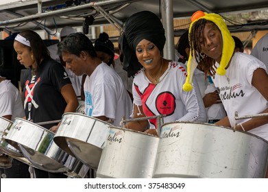 PORT OF SPAIN, TRINIDAD - February 9: Exodus steel orchestra band members perform in down town Port of Spain on carnival Tuesday, February 9, 2016 on the streets of Port of Spain, Trinidad.