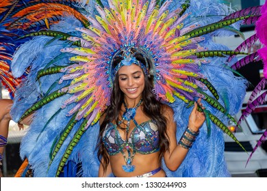 PORT OF SPAIN, TRINIDAD – March 5:  A female Masquerader enjoys herself in the Harts Carnival presentation-Legendary-, March 5, 2019 in Port of Spain, Trinidad.