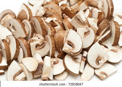 Portabella And Button Mushrooms Sliced On White