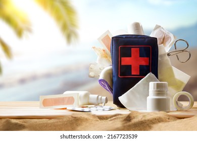 Portable basic first aid equipment for lifeguards for sporting events on the coast and beach or leisure. Horizontal composition. Front view. 