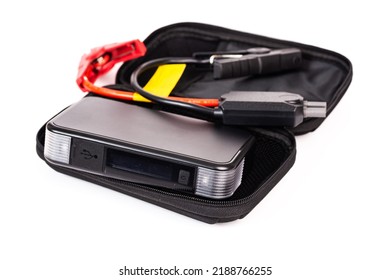 Portable Car Jump Starter. Emergency Charger Booster Power Bank Battery Isolated On White Background.