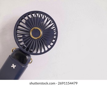portable fan, with simple charging method, x mark is speed and on off button