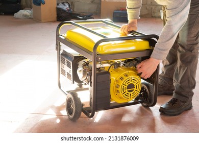 Portable gasoline generator.The use of an autonomous energy source. An additional source of energy. - Shutterstock ID 2131876009