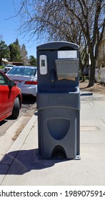 A Portable Hand Washing Station On A Public Street.