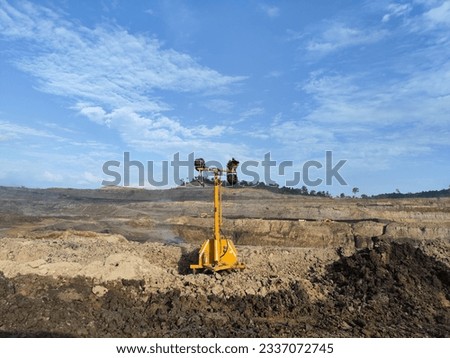 Portable led light tower. Construction site lighting stand with four spotlights.