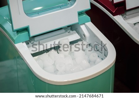Portable mini ice cube maker.