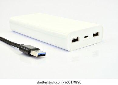 Portable power bank for charging mobile devices - Shutterstock ID 630170990