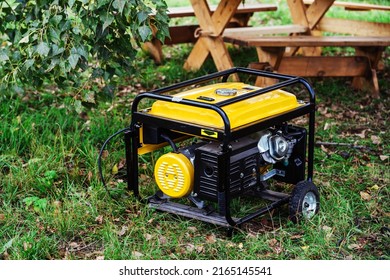 Portable power generator. Compact equipment for powering various devices in nature and in places without power supply. Selective focus. Foreground