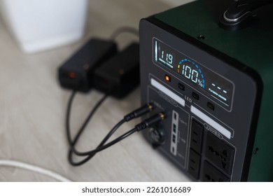 Portable Power Station is charging gadgets. Modern, information technology. Control panel. close up. - Shutterstock ID 2261016689