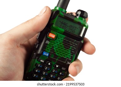 Portable Radio In A Human Hand On A White Background Close Up