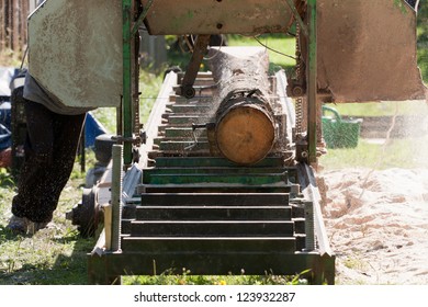 Portable Sawmill Processing Raw Timber To Planks