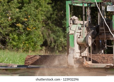 Portable Sawmill Processing Raw Timber To Planks