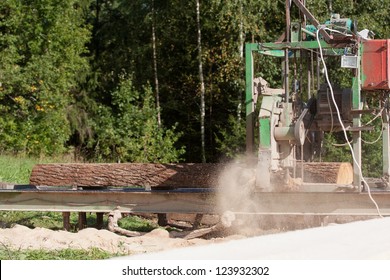 Portable Sawmill Processing Raw Timber To Planks