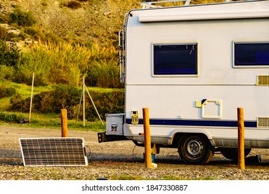 Portable solar photovoltaic panel, charging battery at camper car rv.