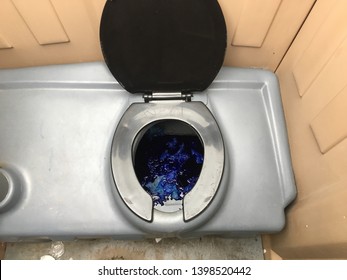 Portable Toilet Bowl Seat Inside Blue Chemical Gross Dirty Construction Event Bathroom Poop Pee Potty