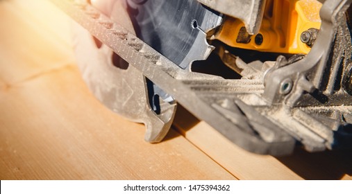 Portable tool circular saw for cutting wood.