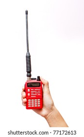 Portable UHF radio transceiver isolated on white background in hand