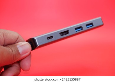 Portable USB hub consisting of USB A port, HDMI port, and USB C port