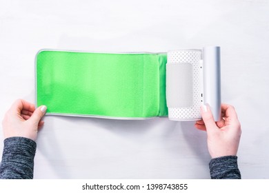 Portable Wireless Blood Pressure Monitor On A White Background.