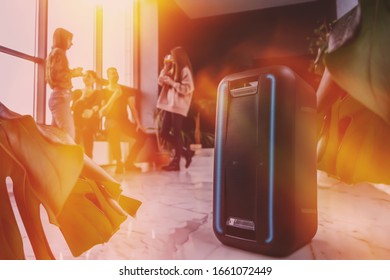 Portable Wireless Bluetooth Speaker On Indoor Party. Toned Image. Entertainment Concept