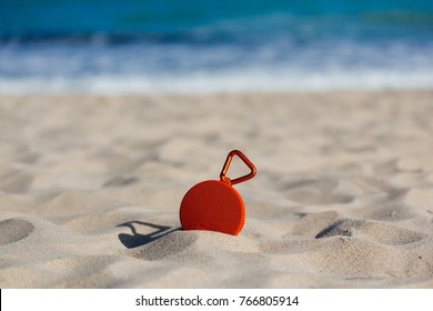 Portable Wireless Speaker On The Beach