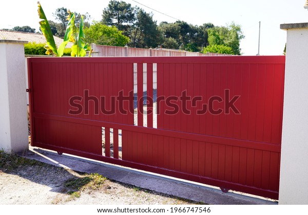 portal aluminum dark red metal gate of suburb house\
steel door