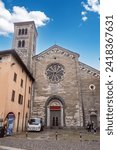 Portal of basilica San Fedele in the city center of Como, Italy