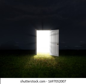 Portal For A Better World. Door Over The Lawn On A Dark Night. Door Over The Lawn On A Dark Night. Intense Glow Coming Out Of The Secluded Door On A Lawn On A Dark Night.