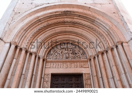 Portal of the rendeemer of Baptistery of Parma (Battistero di Parma). Parma, Italy