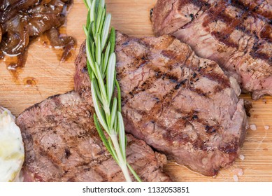 Porter House Steak With Sautéed Onion, American Salad.
