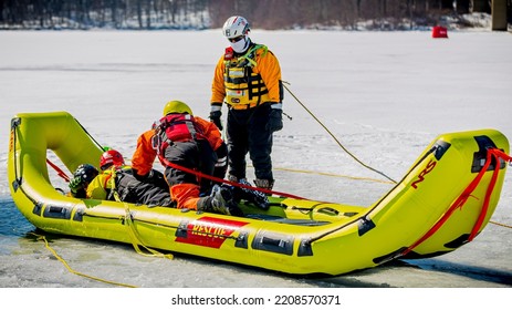 Portersville, Pa., USA - February 21, 2021:  Ice Water Rescue Training Class With Firemen And Paramedics At Moraine State Park, Pa..