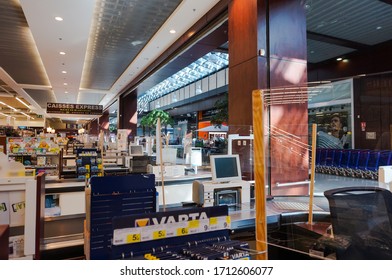 Portes D'Albi, France -April 2020- Deserted Supermarket Checkouts Equipped With Plexiglass Screens For The Health Protection Of Cashiers, In A E. Leclerc Retail Store, Amid The Pandemic Of Coronavirus