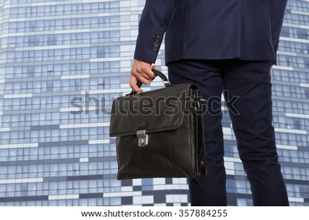 Portfolio investor. Businessman with briefcase 