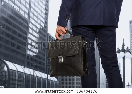 Portfolio investor. Businessman with briefcase 