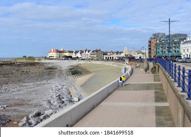 Porthcawl, Bridgend County Borough  , Wales UK - 10.16.2020: A View Along The Curving Promenade By The Sea At Porthcawl.