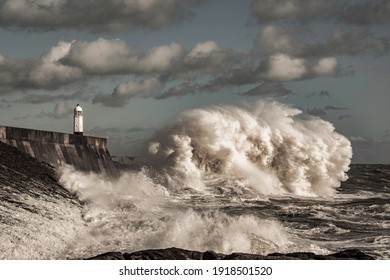 Porthcawl Lighthouse Impending Wave Crash - Shutterstock ID 1918501520