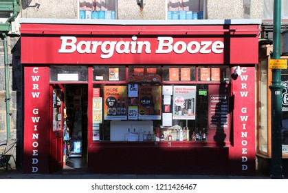 Porthmadog, Gwynedd, Wales, UK.  October 15, 2018. The Red Front Of A Bargain Booze Shop.