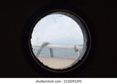 Porthole, a little but beautiful look on the sea. Boat porthole. Sea life. Sailors. Sailing.
