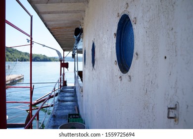 Portholes on a ship moored on Solina.