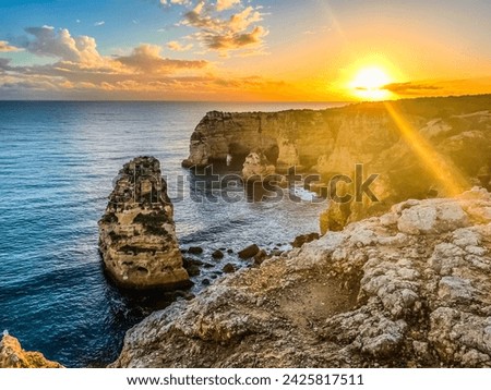 Portimao, Alvor coast, Portugal, Algarve. Rocks, rocky shore, yellow rocks, coquina, beautiful coastline