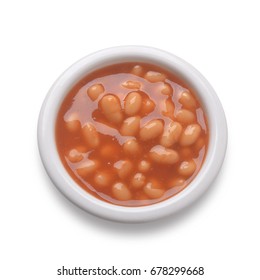 Portion Of Baked Beans In Small White Bowl Shot From Directly Above Isolated On White Background With Path