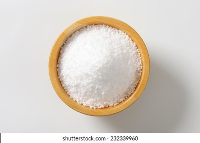 portion of coarse salt in the wooden bowl - Powered by Shutterstock