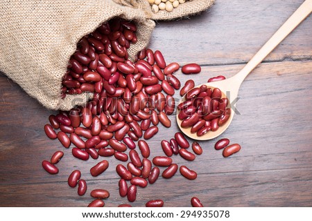 Portion of dried red beans on wooden background Stock foto © 