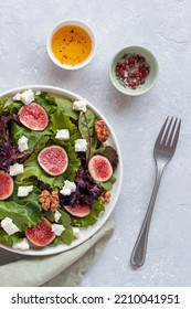 Portion Of Fig, Salad Leaves, Feta And Walnuts Salad, Overhead