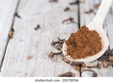 Portion Of Fresh Made Clove Powder On A Wooden Spoon