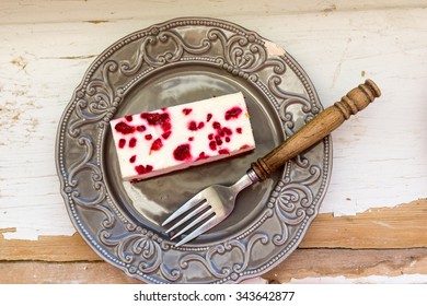 Portion of raspberry cheesecake