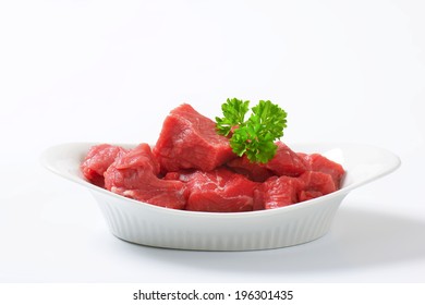 Portion Of Raw Beef Chunks In The Baking Dish